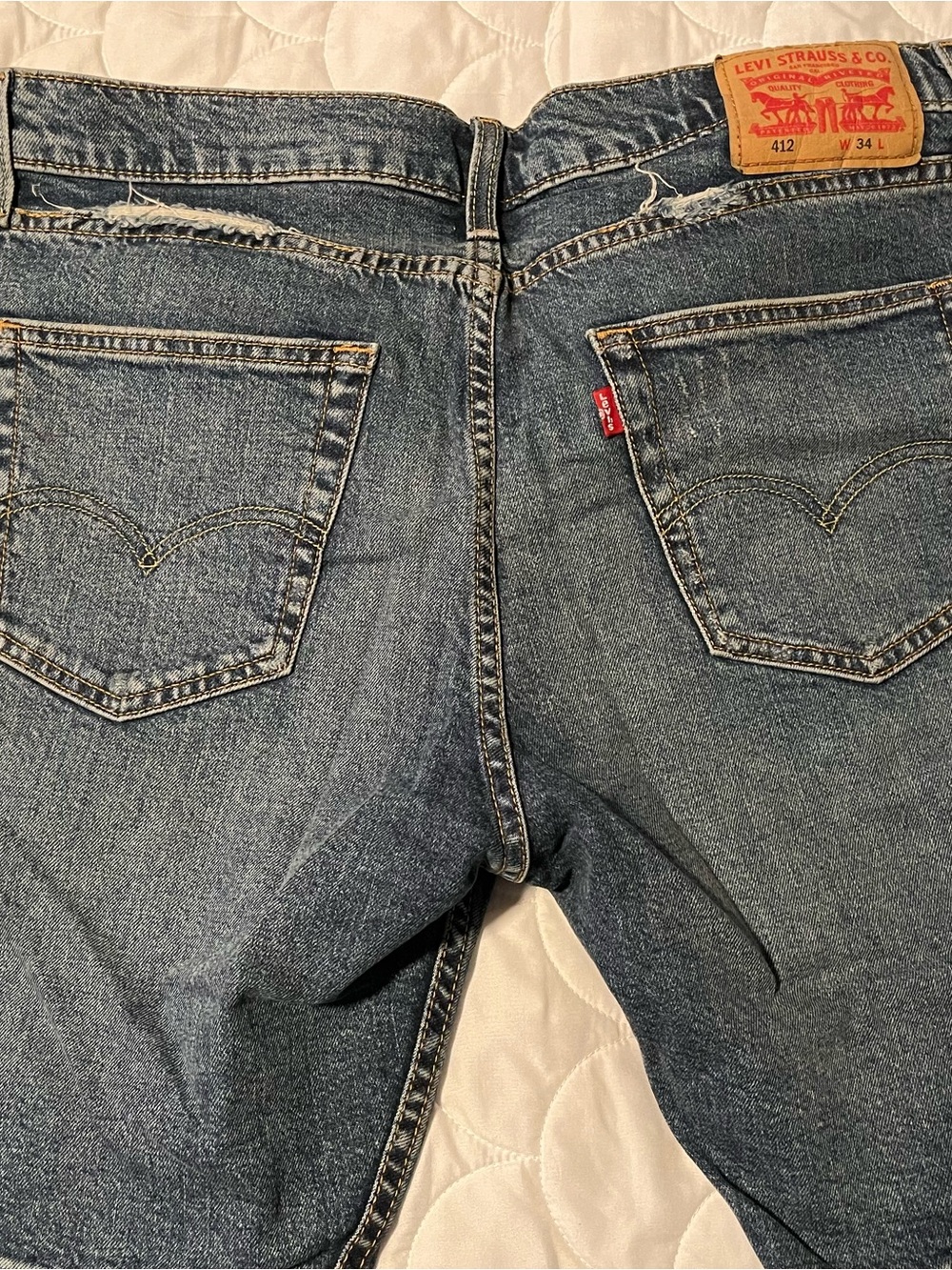 Levi's 412 Slim Straight Jean Shorts in Medium Blue Denim
